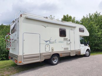 Camping-car Capucine Rimor Transit 2,2 l 125 ch en location à Le Tholy