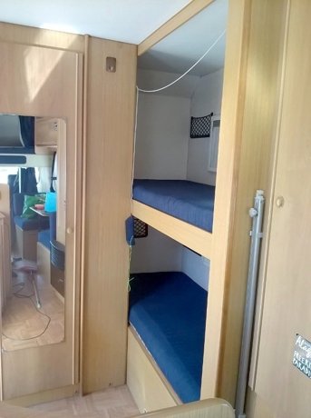 Viaggio del Camper Mansardato