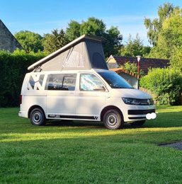 Van Volkswagen T5 2 l 102 ch en location à Moulins En Bessin