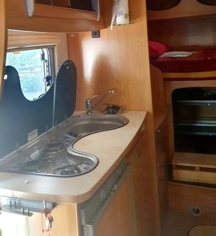 Viaggio del Camper Mansardato