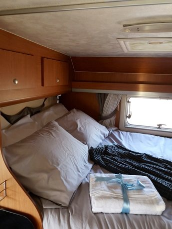 Viaggio del Camper Mansardato